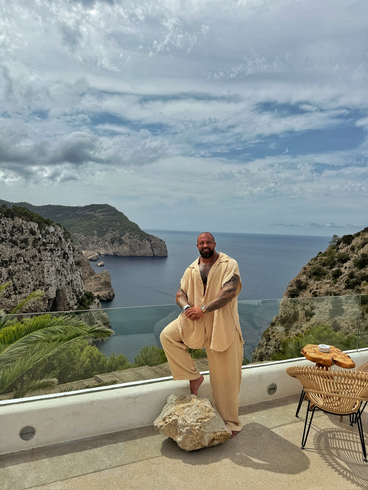 Alex Bodi on a coastal terrace