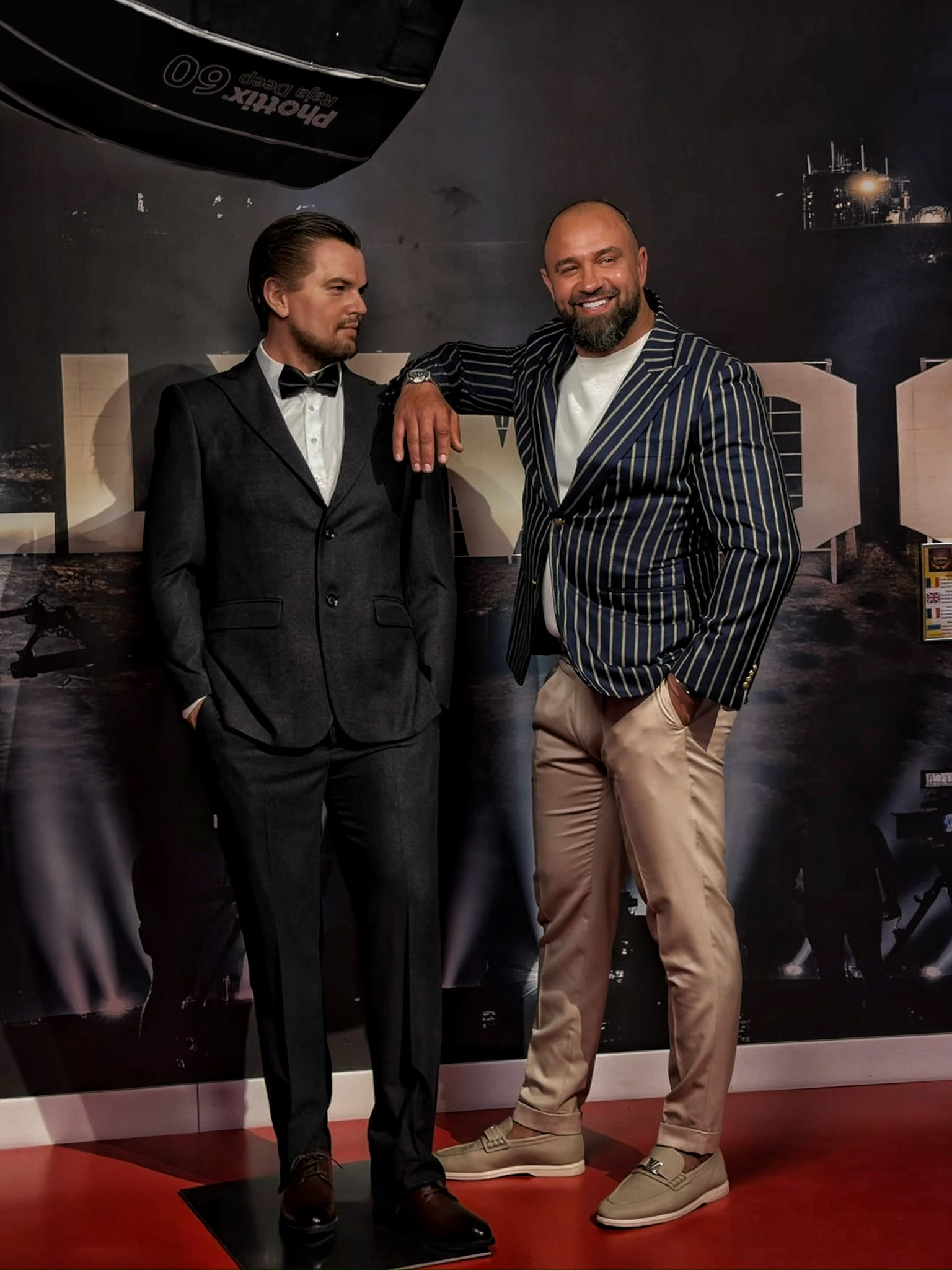 Alex Bodi with a companion at a formal event